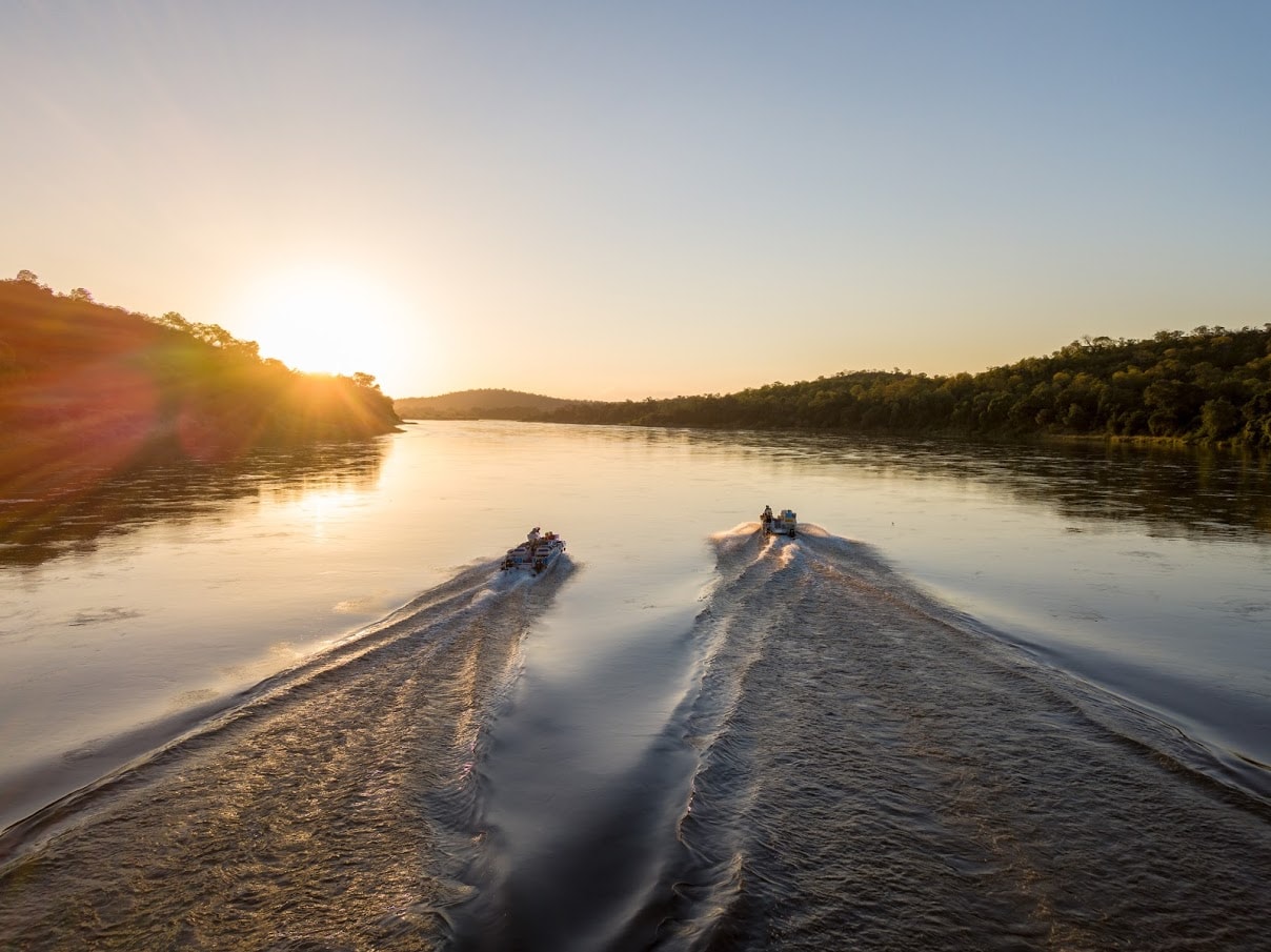 Boat cruise on an African river at sunset
